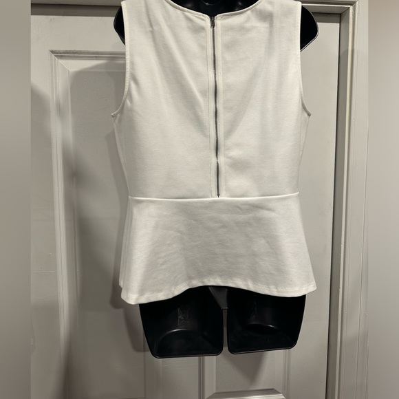 Classic Ivory Peplum Sleeveless Top - Picture 2 of 3